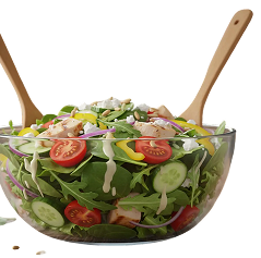 Fresh garden salad in a glass bowl with wooden servers